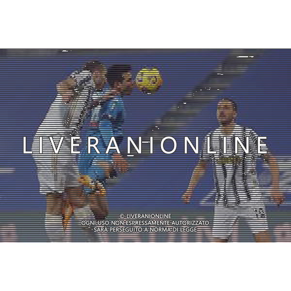 Reggio Emilia 20/01/2021 PS5 Supercoppa Italiana 2020/2021 Juventus vs Napoli - nella foto: Chiellini Giorgio (Juventus f.c.) Lozano Hirving(ssc napoli) ©Claudio Zamagni/Agenzia Aldo Liverani during Italian\'s PS5 Super Cup 2020/2021 soccer match between JUVENTUS F.C and S.S.C.NAPOLI at Mapei Stadium in Reggio Emilia on January 20 2021 photo credit by Claudio Zamagni/Aldo Liverani Photo Agency/AGENZIA ALDO LIVERANI SAS
