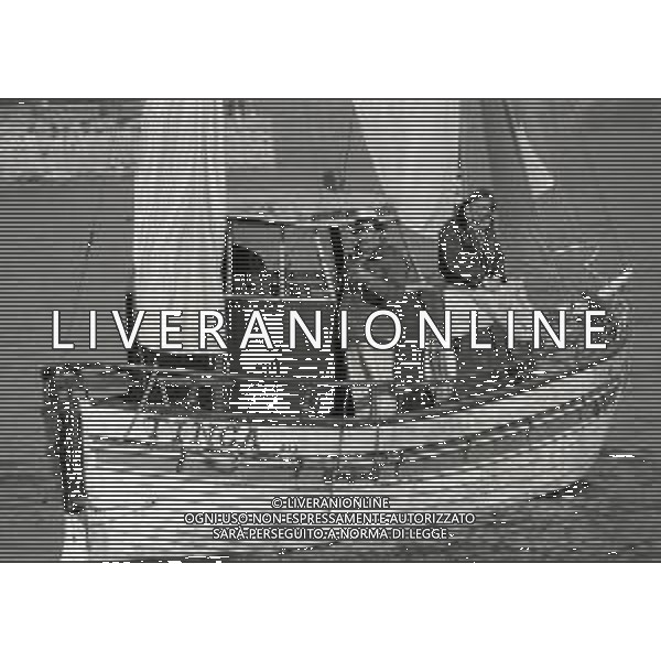 RETROSPETTIVA UGO TOGNAZZI ATTORE NELLA FOTO UGO TOGNAZZI SET DEL FILM “LA STANZA DEL VESCOVO“ NELL\'ANNO 1976 A STRESA AG ALDO LIVERANI SAS 