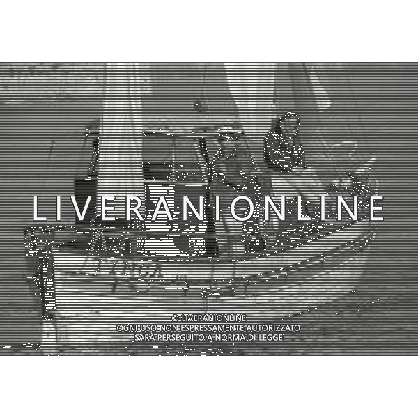 RETROSPETTIVA UGO TOGNAZZI ATTORE NELLA FOTO UGO TOGNAZZI SET DEL FILM “LA STANZA DEL VESCOVO“ NELL\'ANNO 1976 A STRESA AG ALDO LIVERANI SAS 