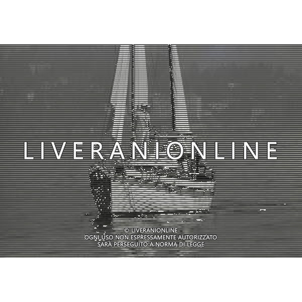 RETROSPETTIVA UGO TOGNAZZI ATTORE NELLA FOTO UGO TOGNAZZI SET DEL FILM “LA STANZA DEL VESCOVO“ NELL\'ANNO 1976 A STRESA AG ALDO LIVERANI SAS 