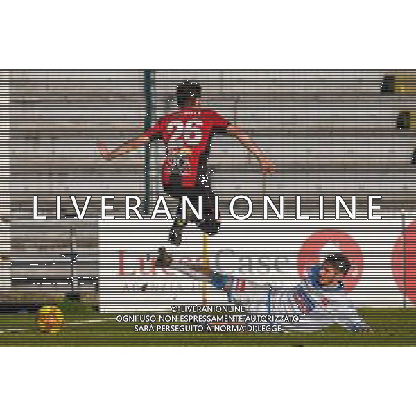 Fabio Fagiolini/LM - Lucchese vs Novara Calcio - Italian football Serie C match 2020/2021 31 January 2021 - Porta Elisa stadium, lucca, Italy Photo showing: Marco Firenze (Novara) in tackle on Andrea Adamoli (Lucchese) @LM/Fabio Fagiolini AG ALDO LIVERANI SAS