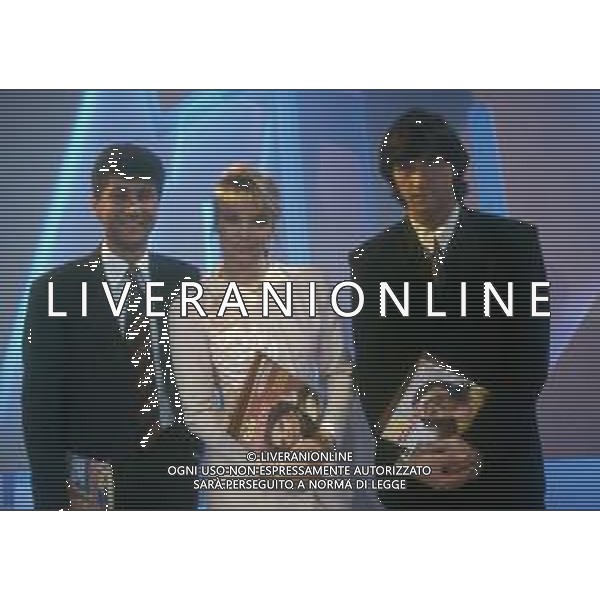 RETROSPETTIVA ROBERTA TERMALI CONDUTTRICE TELEVISIVA NELLA FOTO WALTER ZENGA ROBERTA TERMALI E FABIO FAZIO NELL\'ANNO 1988 NELLA TRASMISSIONE TELEVISIVA “FORZA ITALIA“ ODEON TV AG ALDO LIVERANI SAS