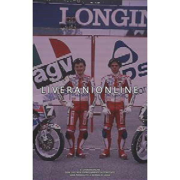 RETROSPETTIVA FAUSTO GRESINI PILOTA MOTOCICLISMO NELLA FOTO FAUSTO GRESINI CON LORIS CAPIROSSI NELL\'ANNO 1991 AG CONTROLUCE-AG ALDO LIVERANI SAS