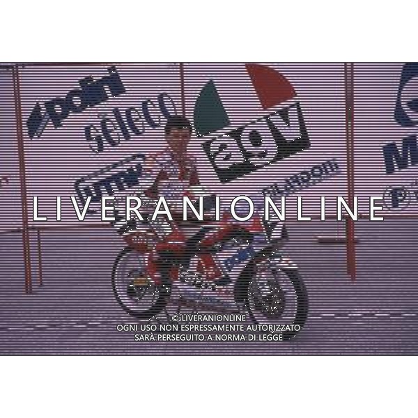 RETROSPETTIVA FAUSTO GRESINI PILOTA MOTOCICLISMO NELLA FOTO FAUSTO GRESINI NELL\'ANNO 1991 AG CONTROLUCE-AG ALDO LIVERANI SAS