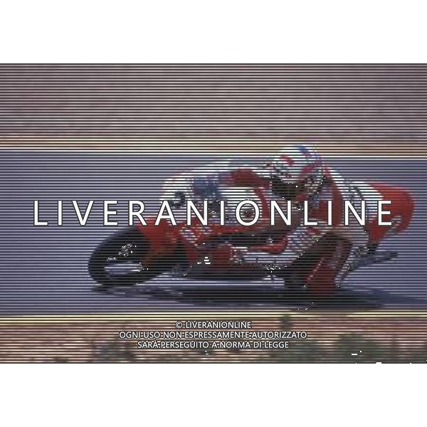 RETROSPETTIVA FAUSTO GRESINI PILOTA MOTOCICLISMO NELLA FOTO FAUSTO GRESINI NELL\'ANNO 1992 AG CONTROLUCE-AG ALDO LIVERANI SAS
