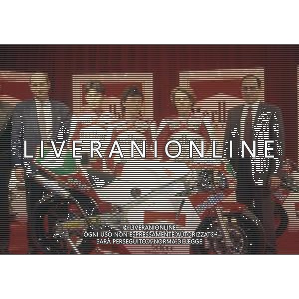 RETROSPETTIVA FAUSTO GRESINI PILOTA MOTOCICLISMO NELLA FOTO FAUSTO GRESINI CON LORIS CAPIROSSI NOROBU UEDA E I FRATELLI PILERI AG CONTROLUCE-AG ALDO LIVERANI SAS 
