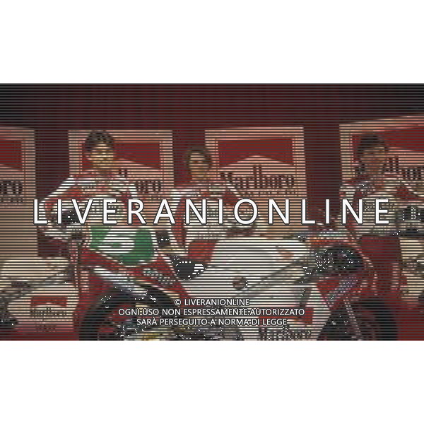 RETROSPETTIVA FAUSTO GRESINI PILOTA MOTOCICLISMO NELLA FOTO FAUSTO GRESINI CON LORIS CAPIROSSI E NOROBU UEDA AG CONTROLUCE-AG ALDO LIVERANI SAS  