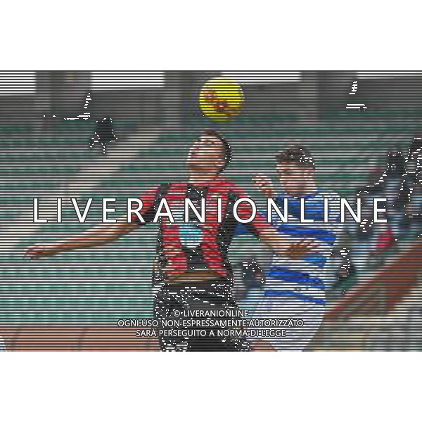 Fabio Fagiolini/LM - Lucchese vs Pro Patria - Italian football Serie C match 2020/2021 17 February 2021 - lucca, Italy Photo showing: Tomi Petrovic (Lucchese) in aerial duel with Leonardo Galli (Pro Patria) @LM/Fabio Fagiolini/AGENZIA ALDO LIVERANI SAS