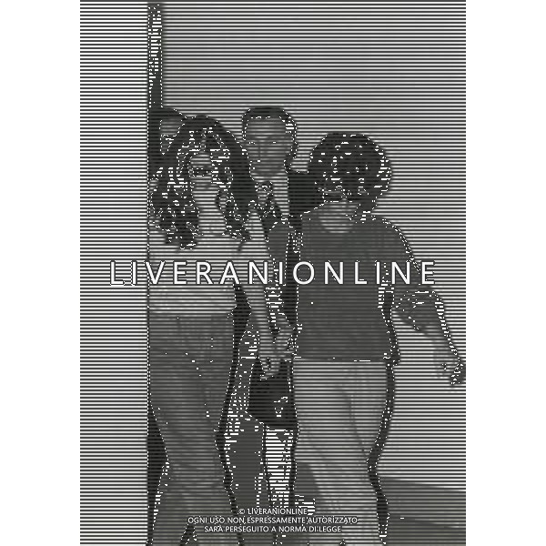1987 CREMONA -PROCESSO PORCELLINO ROSA MARIO ALQUATI ARRESTATO PER BANCAROTTA FRAUDOLENTA CON UN BUCO DI 78 MILIARDI DI LIRE IN FUGA CON L\'AMANTE MICHELA FERRARI NELLA FOTO MICHELA FERRARI PRESUNTA AMANTE DI MARIO ALQUATI IN TRIBUNALE PER TESTIMONIARE AG ALDO LIVERANI SAS