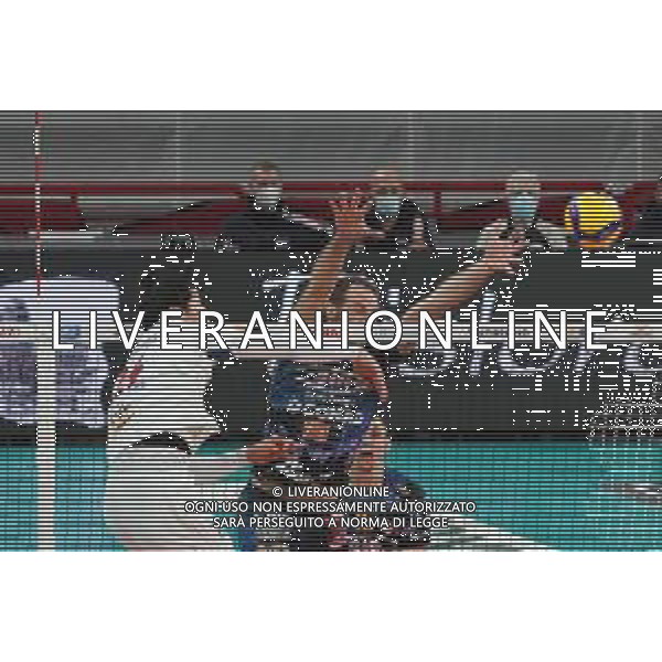 Cerquiglinio/LMedia - Playoff - Sir Safety Conad Perugia vs Allianz Milano - Volleyball Italian Serie A Men Superleague Championship 2020/2021 10 March 2021 - Pala Barton, perugia, Italy Photo showing: travica dragan (n.04 setter sir safety conad perugia) block yuki ishikawa (n.14 hitter spicker power volley milano) attack @Cerquiglinio/LMedia/ AGENZIA ALDO LIVERANI SAS