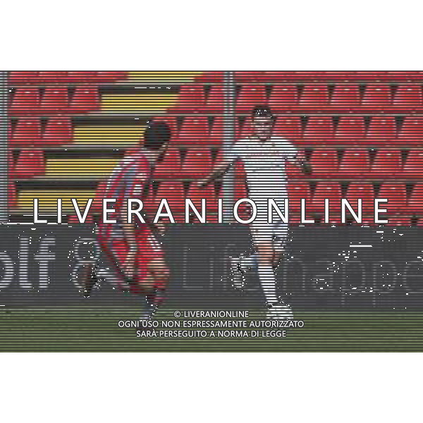 Carnabucia/LMedia - US Cremonese vs AC Reggiana - Italian Football Championship League BKT 2020/2021 13 March 2021 - Giovanni Zini stadium, cremona, Italy Photo showing: Andrea Costa (Reggiana) in action on Matteo Bianchetti (Cremonese) @Carnabucia/LMedia/ AGENZIA ALDO LIVERANI SAS
