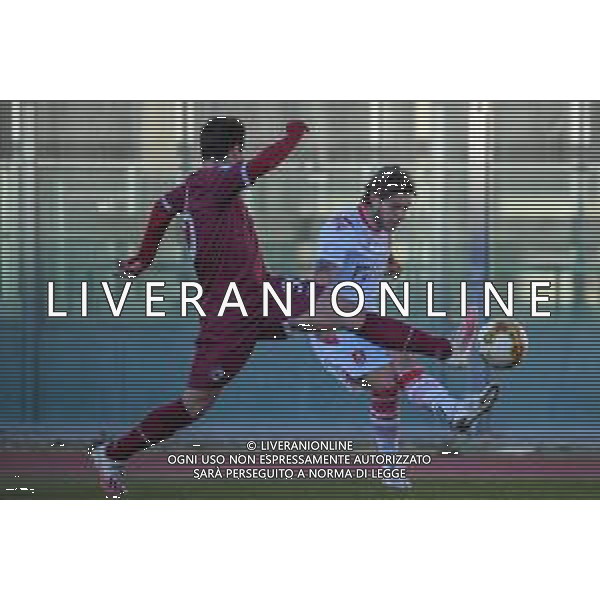 Fagiolinia/LMedia - Livorno vs Grosseto - Campionato di Calcio Serie C - Lega Pro 2020/2021 16 marzo 2021 - Stadio Armando Picchi, Livorno, Italia Nella foto: Axel Campeol (Grosseto) crossa contrastato da Andrea Gemignani (Livorno) @Fagiolinia/LMedia AG ALDO LIVERANI SAS