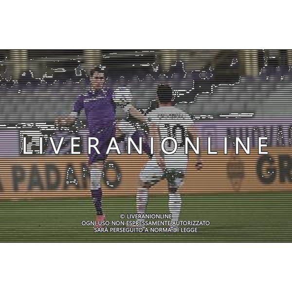 Papinia/LMedia - ACF Fiorentina vs AC Milan - Italian football Serie A match 2020/2021 21 March 2021 - Artemio Franchi stadium, florence, Italy Photo showing: Dusan Vllahovic of ACF Fiorentina in action against Hakan Calhanoglu of AC Milan @Papinia/LMedia AG ALDO LIVERANI SAS