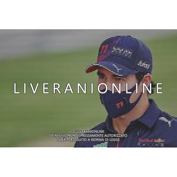 Sergio Perez (MEX) Red Bull Racing. 25.03.2021. Formula 1 World Championship, Rd 1, Bahrain Grand Prix, Sakhir, Bahrain, Preparation Day. - www.xpbimages.com, EMail: requests@xpbimages.com © Copyright: Batchelor / XPB Images/ AGENZIA ALDO LIVERANI SAS - ITALY ONLY EDITORIAL USE ONLY