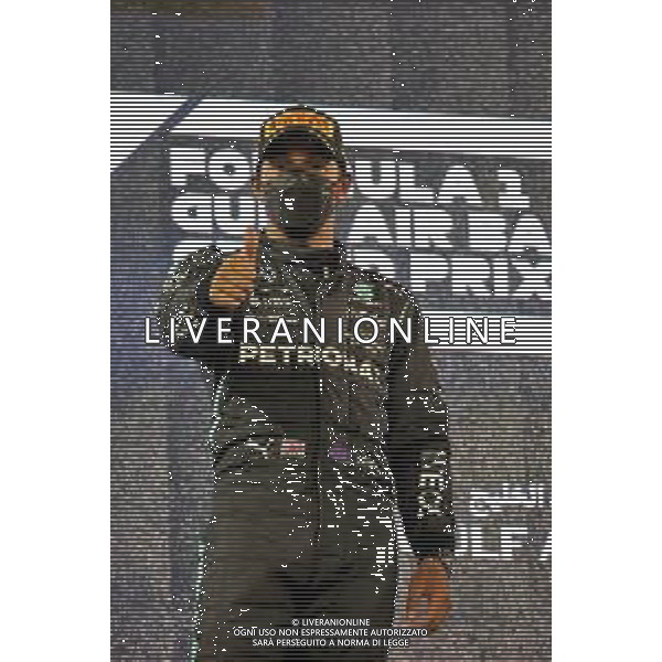 Race winner Lewis Hamilton (GBR) Mercedes AMG F1 celebrates on the podium. 28.03.2021. Formula 1 World Championship, Rd 1, Bahrain Grand Prix, Sakhir, Bahrain, Race Day. - www.xpbimages.com, EMail: requests@xpbimages.com © Copyright: Batchelor / XPB Images/ AGENZIA ALDO LIVERANI SAS - ITALY ONLY EDITORIAL USE ONLY