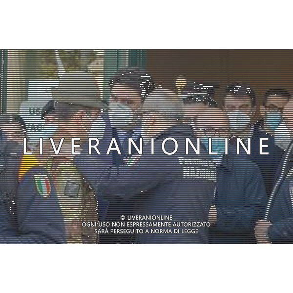 1-4-2021. Il Generale Francesco Paolo Figliuolo, commissario straordinario attuazione e coordinamento misure per il contenimento e contrasto dell\'emergenza epidemiologica COVID-19.e Fabrizio Curcio, capo della Protezione Civile Italiana, si recano a Cagliari in Sardegna, per valutare situazione Covid e vaccini. Visitano il centro vaccinazioni Covid-19, sito presso la Fiera Campionaria della Sardegna in Cagliari. Salvatore Moi/Aldo Liverani sas. Nella foto: da sinistra a destra: Generale Francesco Paolo Figliuolo, commissario straordinario attuazione e coordinamento misure per il contenimento e contrasto dell\'emergenza epidemiologica COVID-19, Cristian Solinas governatore Sardegna, Fabrizio Curcio capo Protezione Civile italiana./AGENZIA ALDO LIVERANI SAS