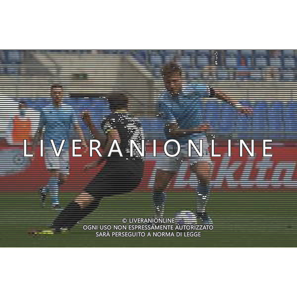 Lazio vs Spezia Campionato Serie A TIM - 29 giornata Stadio Olimpico - Roma 03-04-2021 nella foto Immobile e Bastoni foto federico gaetano-ag aldo liverani sas