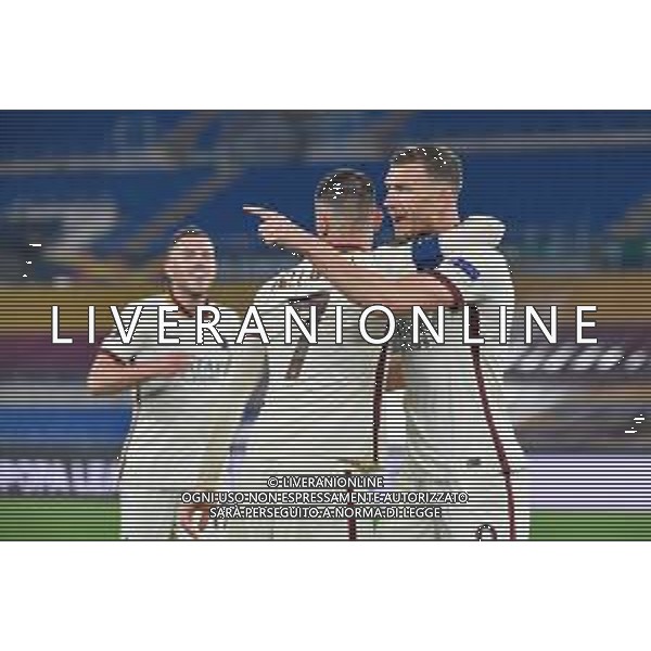Corradettia/LMedia - AS Roma vs AFC Ajax - football Europa League match 2020/2021 15 April 2021 - Stadio Olimpico, rome, Italy Photo showing: Edin Dzeko of AS Roma and Lorenzo Pellegrini of AS Romacelebrates after scoring goal 1-1 seen in action @Corradettia/LMedia/ AGENZIA ALDO LIVERANI SAS