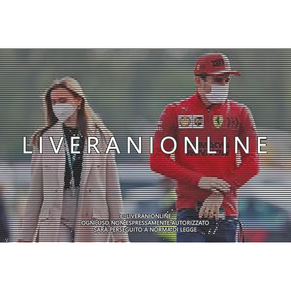 Charles Leclerc (MON) Ferrari with his girlfriend Charlotte Sine (MON). 16.04.2021. Formula 1 World Championship, Rd 2, Emilia Romagna Grand Prix, Imola, Italy, Practice Day. - www.xpbimages.com, EMail: requests@xpbimages.com © Copyright: Charniaux / XPB Images/ AGENZIA ALDO LIVERANI SAS - ITALY ONLY EDITORIAL USE ONLY - Prove Libere