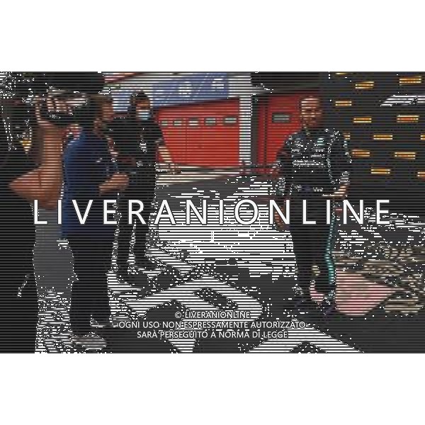 Pole sitter Lewis Hamilton (GBR) Mercedes AMG F1 in qualifying parc ferme. 17.04.2021. Formula 1 World Championship, Rd 2, Emilia Romagna Grand Prix, Imola, Italy, Qualifying Day. - www.xpbimages.com, EMail: requests@xpbimages.com © Copyright: FIA Pool Image for Editorial Use Only/ AGENZIA ALDO LIVERANI SAS - ITALY ONLY EDITORIAL USE ONLY