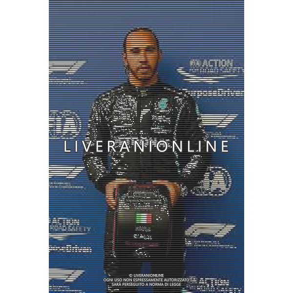 Lewis Hamilton (GBR) Mercedes AMG F1 celebrates with the Pirelli Pole Position Award in qualifying parc ferme. 17.04.2021. Formula 1 World Championship, Rd 2, Emilia Romagna Grand Prix, Imola, Italy, Qualifying Day. - www.xpbimages.com, EMail: requests@xpbimages.com © Copyright: FIA Pool Image for Editorial Use Only/ AGENZIA ALDO LIVERANI SAS - ITALY ONLY EDITORIAL USE ONLY