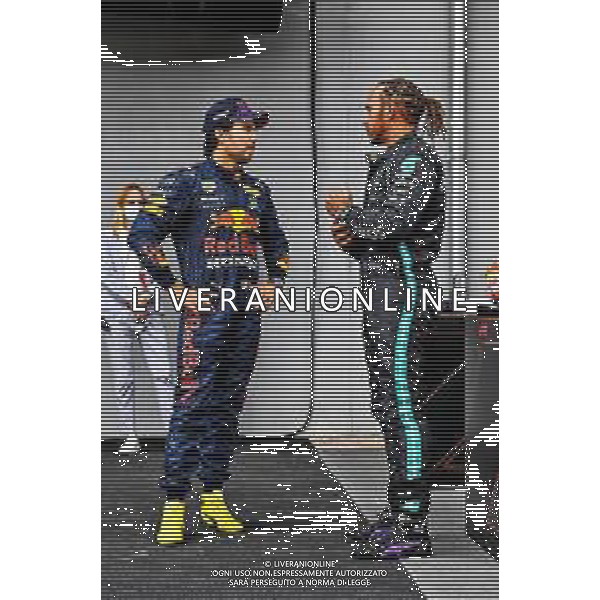 (L to R): second placed Sergio Perez (MEX) Red Bull Racing with pole sitter Lewis Hamilton (GBR) Mercedes AMG F1 in qualifying parc ferme. 17.04.2021. Formula 1 World Championship, Rd 2, Emilia Romagna Grand Prix, Imola, Italy, Qualifying Day. - www.xpbimages.com, EMail: requests@xpbimages.com © Copyright: FIA Pool Image for Editorial Use Only/ AGENZIA ALDO LIVERANI SAS - ITALY ONLY EDITORIAL USE ONLY