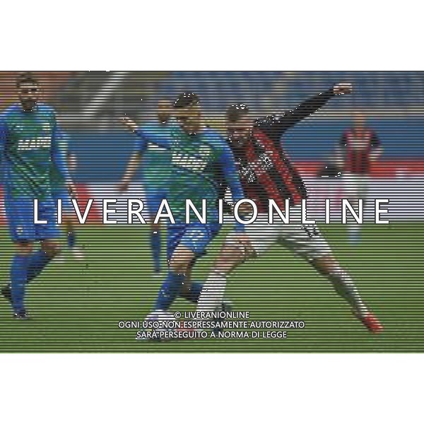 Mert Muldur (Sassuolo) e Ante Rebic (Milan) Milan vs Sassuolo Campionato Serie A TIM - 32a giornata Milano 21-04-2021 Stadio Giuseppe Meazza - San Siro foto Roberto Garavaglia/ag. Aldo Liverani sas / AGENZIA ALDO LIVERANI SAS