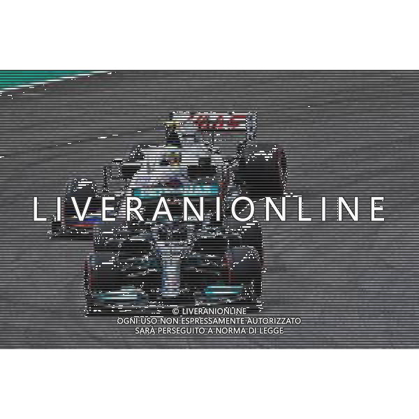 Lewis Hamilton (GBR) Mercedes AMG F1 W12 leads Mick Schumacher (GER) Haas VF-21. 30.04.2021. Formula 1 World Championship, Rd 3, Portuguese Grand Prix, Portimao, Portugal, Practice Day. - www.xpbimages.com, EMail: requests@xpbimages.com © Copyright: Staley / XPB Images / AGENZIA ALDO LIVERANI SAS - ITALY ONLY EDITORIAL USE ONLY
