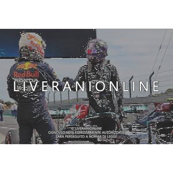Race winner Lewis Hamilton (GBR) Mercedes AMG F1 W12 celebrates in parc ferme with second placed Max Verstappen (NLD) Red Bull Racing. 02.05.2021. Formula 1 World Championship, Rd 3, Portuguese Grand Prix, Portimao, Portugal, Race Day. - www.xpbimages.com, EMail: requests@xpbimages.com © Copyright: Batchelor / XPB Images/ AGENZIA ALDO LIVERANI SAS - ITALY ONLY EDITORIAL USE ONLY - GP F1 World Championship Portogallo Grand Prix, Portimao 02.05.2021
