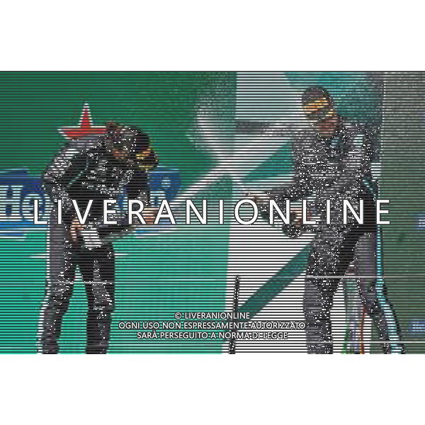 (L to R): Race winner Lewis Hamilton (GBR) Mercedes AMG F1 celebrates on the podium with third placed team mate Valtteri Bottas (FIN) Mercedes AMG F1. 02.05.2021. Formula 1 World Championship, Rd 3, Portuguese Grand Prix, Portimao, Portugal, Race Day. - www.xpbimages.com, EMail: requests@xpbimages.com © Copyright: Staley / XPB Images/ AGENZIA ALDO LIVERANI SAS - ITALY ONLY EDITORIAL USE ONLY - GP F1 World Championship Portogallo Grand Prix, Portimao 02.05.2021
