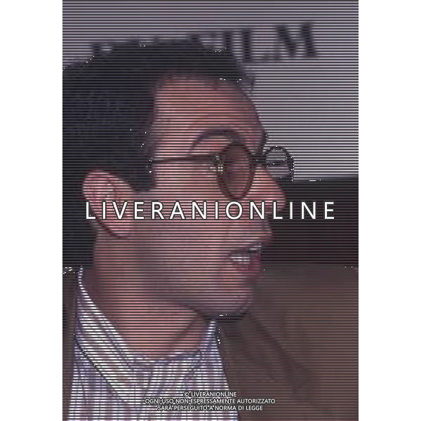 RETROSPETTIVA GIUSEPPE TORNATORE REGISTA NELLA FOTO GIUSEPPE TORNATORE AL FESTIVAL DI CANNES NELL\'ANNO 1989 FILM IN CONCORSO“ CINEMA PARADISO“ AG ALDO LIVERANI SAS