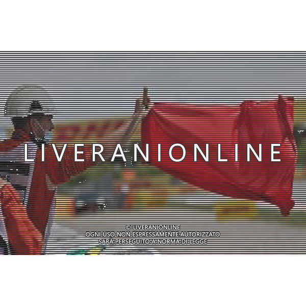 Circuit atmosphere - a marshal waves a red flag in the first practice session. 07.05.2021 Formula 1 World Championship, Rd 4, Spanish Grand Prix, Barcelona, Spain, Practice Day. - www.xpbimages.com, EMail: requests@xpbimages.com © Copyright: Batchelor / XPB Images / AGENZIA ALDO LIVERANI SAS - ITRALY ONLY EDITORIAL USE ONLY
