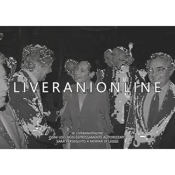 1996 MILANO HOTEL RAMADA PRESENTAZIONE DEL NUOVO MARCHIO DELLA LEGA CALCIO NELLA FOTO LUCIANO NIZZOLA CON CANDIDO CANNAVO\' E MOGLIE AG ALDO LIVERANI SAS