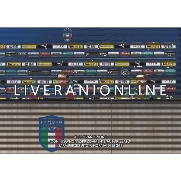 FLORENCE, ITALY - JUNE 03: Head coach Italy Roberto Mancini and Emerson Palmieri of Italy speak with the media during a press conference at Coverciano on June 03, 2021 in Florence, Italy. (Photo by Claudio Villa/Getty Images)/AGENZIA ALDO LIVERANI SAS