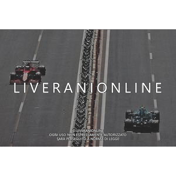 Charles Leclerc (MON) Ferrari SF-21 and Sebastian Vettel (GER) Aston Martin F1 Team AMR21. 05.06.2021. Formula 1 World Championship, Rd 6, Azerbaijan Grand Prix, Baku Street Circuit, Azerbaijan, Qualifying Day. - www.xpbimages.com, EMail: requests@xpbimages.com © Copyright: Moy / XPB Images/AGENZIA ALDO LIVERANI SAS - ITALY ONY EDITORIAL USE ONLY