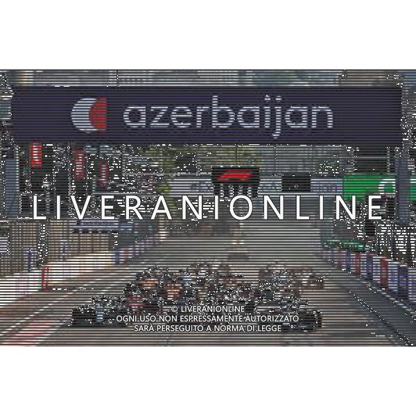 (L to R): Sebastian Vettel (GER) Aston Martin F1 Team AMR21; Sergio Perez (MEX) Red Bull Racing RB16B; and Lewis Hamilton (GBR) Mercedes AMG F1 W12 at the restart of the race. 06.06.2021. Formula 1 World Championship, Rd 6, Azerbaijan Grand Prix, Baku Street Circuit, Azerbaijan, Race Day. - www.xpbimages.com, EMail: requests@xpbimages.com © Copyright: Batchelor / XPB Images/ AGENZIA ALDO LIVERANI SAS - ITALY ONLY EDITORIAL USE ONLY