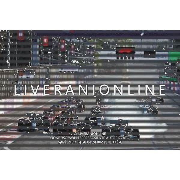 Lewis Hamilton (GBR) Mercedes AMG F1 W12 locks up under braking at the restart of the race while attempting to pass Sergio Perez (MEX) Red Bull Racing RB16B. 06.06.2021. Formula 1 World Championship, Rd 6, Azerbaijan Grand Prix, Baku Street Circuit, Azerbaijan, Race Day. - www.xpbimages.com, EMail: requests@xpbimages.com © Copyright: Batchelor / XPB Images/ AGENZIA ALDO LIVERANI SAS - ITALY ONLY EDITORIAL USE ONLY