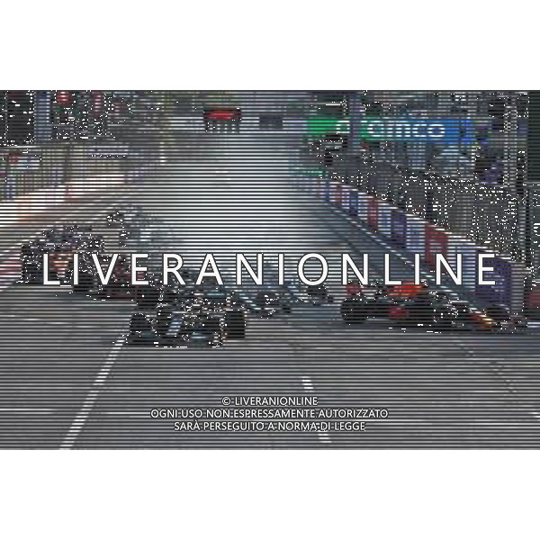 Lewis Hamilton (GBR) Mercedes AMG F1 W12 locks up under braking at the restart of the race while attempting to pass Sergio Perez (MEX) Red Bull Racing RB16B. 06.06.2021. Formula 1 World Championship, Rd 6, Azerbaijan Grand Prix, Baku Street Circuit, Azerbaijan, Race Day. - www.xpbimages.com, EMail: requests@xpbimages.com © Copyright: Batchelor / XPB Images/ AGENZIA ALDO LIVERANI SAS - ITALY ONLY EDITORIAL USE ONLY