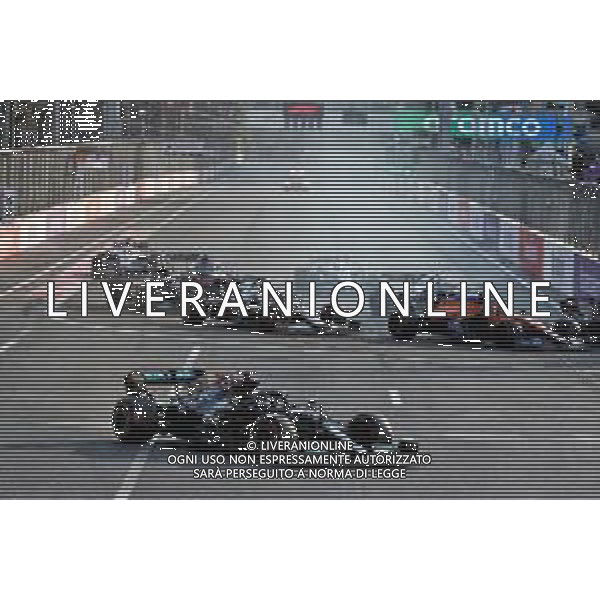 Lewis Hamilton (GBR) Mercedes AMG F1 W12 locks up under braking and runs wide at the restart of the race while attempting to pass Sergio Perez (MEX) Red Bull Racing RB16B. 06.06.2021. Formula 1 World Championship, Rd 6, Azerbaijan Grand Prix, Baku Street Circuit, Azerbaijan, Race Day. - www.xpbimages.com, EMail: requests@xpbimages.com © Copyright: Batchelor / XPB Images/ AGENZIA ALDO LIVERANI SAS - ITALY ONLY EDITORIAL USE ONLY