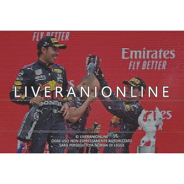 Race winner Max Verstappen (NLD) Red Bull Racing celebrates on the podium with Gianpiero Lambiase (ITA) Red Bull Racing Engineer and team mate Sergio Perez (MEX) Red Bull Racing. 20.06.2021. Formula 1 World Championship, Rd 7, French Grand Prix, Paul Ricard, France, Race Day. - www.xpbimages.com, EMail: requests@xpbimages.com © Copyright: Moy / XPB Images/AGENZIA ALDO LIVERANI SAS - ITALY ONLY EDITORIAL USE ONLY