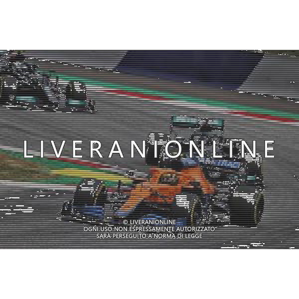 Lando Norris (GBR) McLaren MCL35M. 04.07.2021. Formula 1 World Championship, Rd 9, Austrian Grand Prix, Spielberg, Austria, Race Day. - www.xpbimages.com, EMail: requests@xpbimages.com © Copyright: Charniaux / XPB Images/AGENZIA ALDO LIVERANI SAS - ITALY ONLY -EDITORIAL USE ONLY