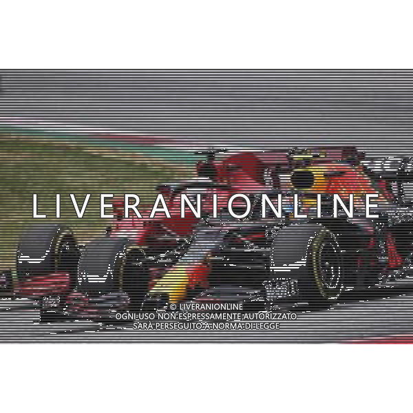 Sergio Perez (MEX) Red Bull Racing RB16B and Charles Leclerc (MON) Ferrari SF-21 battle for position. 04.07.2021. Formula 1 World Championship, Rd 9, Austrian Grand Prix, Spielberg, Austria, Race Day. - www.xpbimages.com, EMail: requests@xpbimages.com © Copyright: Charniaux / XPB Images/AGENZIA ALDO LIVERANI SAS - ITALY ONLY -EDITORIAL USE ONLY