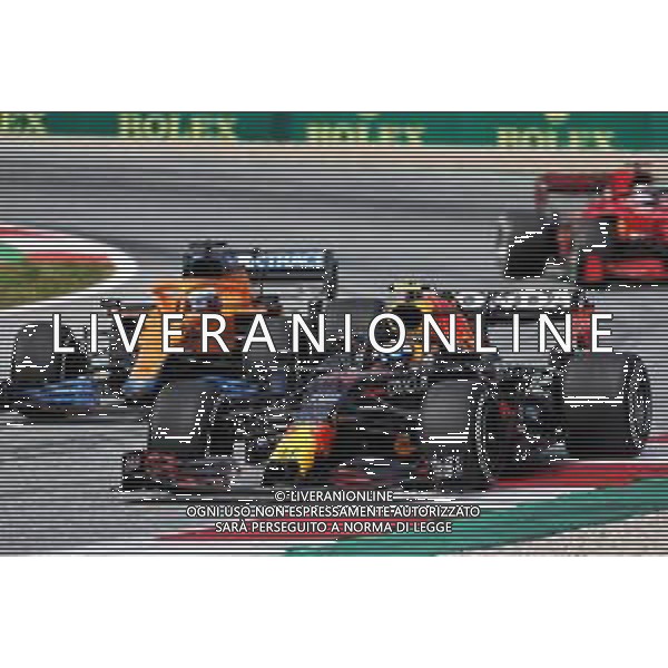 Sergio Perez (MEX) Red Bull Racing RB16B. 04.07.2021. Formula 1 World Championship, Rd 9, Austrian Grand Prix, Spielberg, Austria, Race Day. - www.xpbimages.com, EMail: requests@xpbimages.com © Copyright: Charniaux / XPB Images/AGENZIA ALDO LIVERANI SAS - ITALY ONLY -EDITORIAL USE ONLY