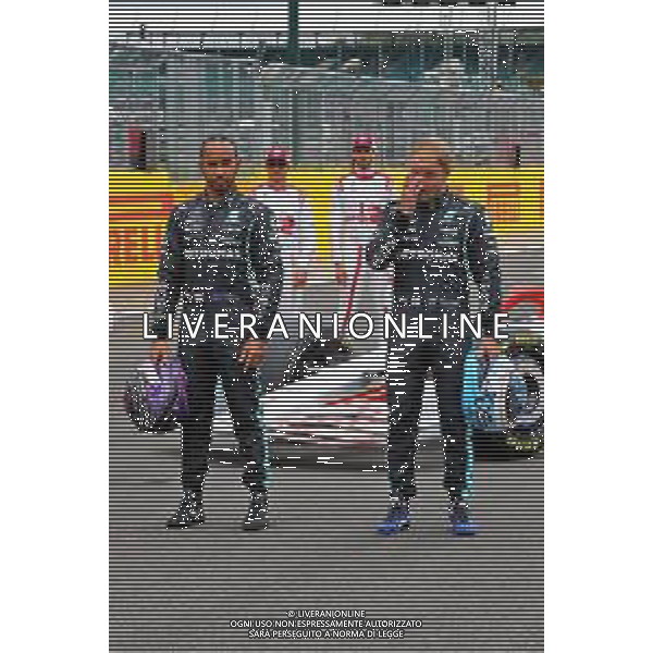 (L to R): Lewis Hamilton (GBR) Mercedes AMG F1 and team mate Valtteri Bottas (FIN) Mercedes AMG F1 - 2022 Car Launch. 15.07.2021. Formula 1 World Championship, Rd 10, British Grand Prix, Silverstone, England, Preparation Day. - www.xpbimages.com, EMail: requests@xpbimages.com © Copyright: Davenport / XPB Images/AGENZIA ALDO LIVERANI SAS - ITALY ONLY EDITORIAL USE ONLY