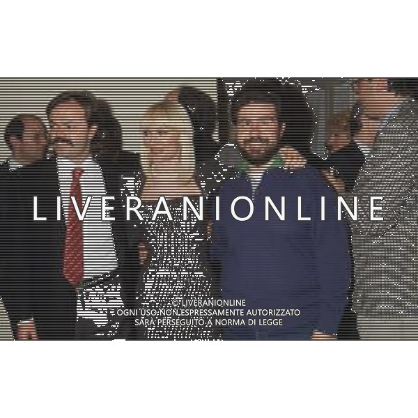 RAFFAELLA CARRA\' CANTANTE E ATTRICE - RETROSPETTIVA NELLA FOTO CON IL COMPAGNO SERGIO JAPINO NEL 1988 CON LELLO ARENA ©ARCHIVIO GIOVANNI LIVERANI /AG. ALDO LIVERANI SAS