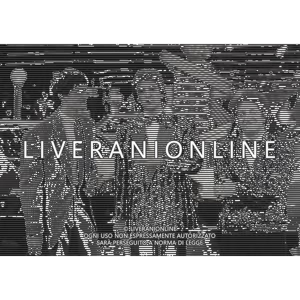 RETROSPETTIVA ALESSANDRO ALTOBELLI CALCIATORE NELLA FOTO ALESSANDRO ALTOBELLI CON EZIO GREGGIO GIANFRANCO D\'ANGELO NELL\'ANNO 1986 NELLA TRASMISSIONE TELEVISIVA“DRIVE IN“ AG ALDO LIVERANI SAS 