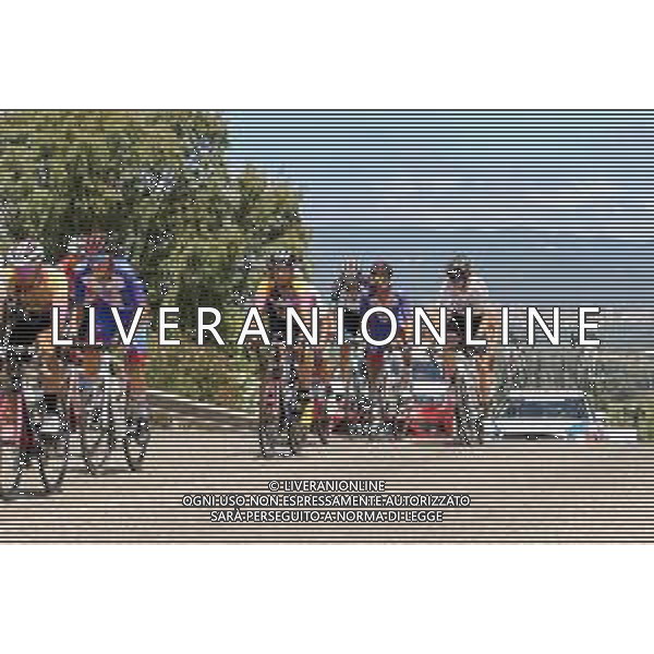 18-7-2021. Settimana Ciclistica Italiana sulle strade della Sardegna. Gara internazionale di ciclismo. Quinta tappa, Cagliari, Sardegna, Italia. Salvatore Moi/Aldo Liverani s.a.s. Nella foto: ciclisti in uscita da Carbonia sulla strada statle SP2 Pedemontana.