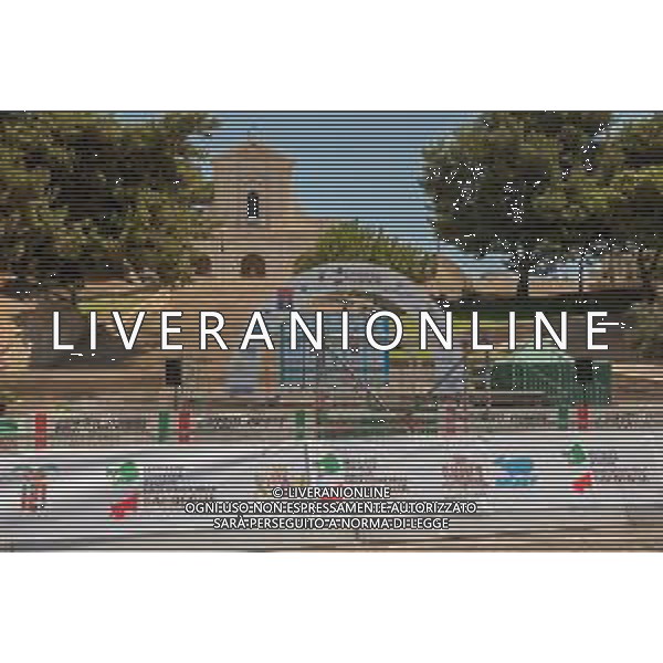 18-7-2021. Settimana Ciclistica Italiana sulle strade della Sardegna. Gara internazionale di ciclismo. Quinta tappa, Cagliari, Sardegna, Italia. Salvatore Moi/Aldo Liverani s.a.s. Nella foto: Nella foto: Arrivo 5° tappa, Viale Armando Diaz, Cagliari. Podio premiazioni vincitori. Nello sfondo Basilica Madonna Bonaria.