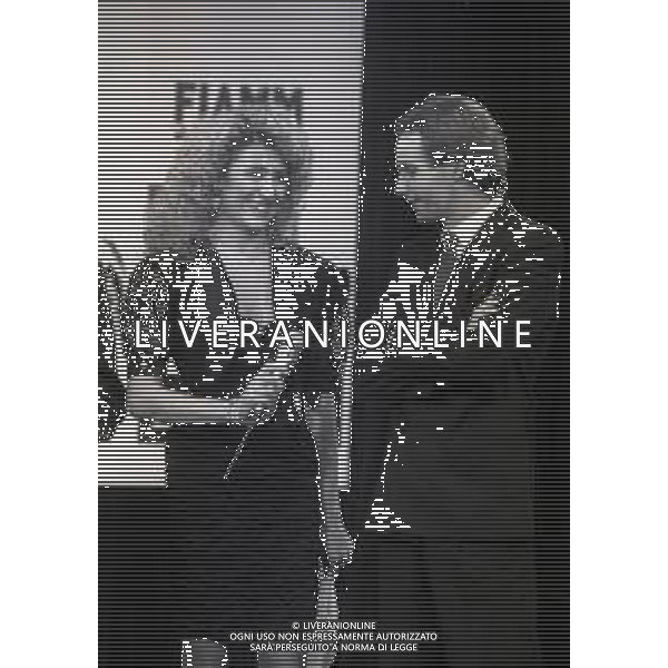 RETROSPETTIVA GERHARD BERGER PILOTA F1 NELLA FOTO GERHARD BERGER NELL\'ANNO 1987 A CAMPIONE D\'ITALIA CON GABRIELLA CARLUCCI AG ALDO LIVERANI SAS