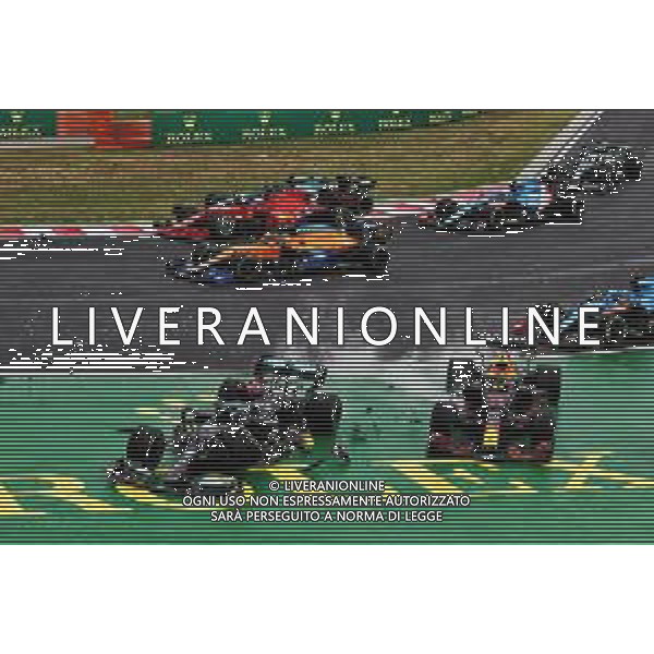 Valtteri Bottas (FIN) Mercedes AMG F1 W12 and Sergio Perez (MEX) Red Bull Racing RB16B crash at the start of the race. 01.08.2021. Formula 1 World Championship, Rd 11, Hungarian Grand Prix, Budapest, Hungary, Race Day. - www.xpbimages.com, EMail: requests@xpbimages.com © Copyright: Moy / XPB Images/AGENZIA ALDO LIVERANI SAS - ITALY ONLY EDITORIAL USE ONLY